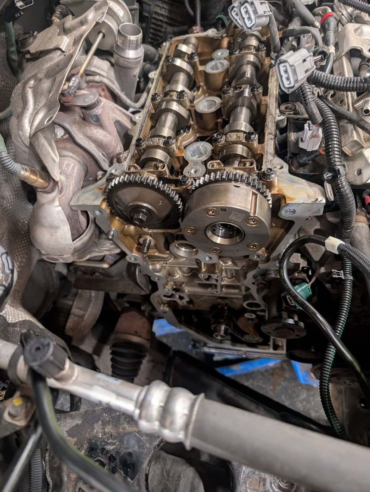 Cylinder head and camshafts exposed during engine work